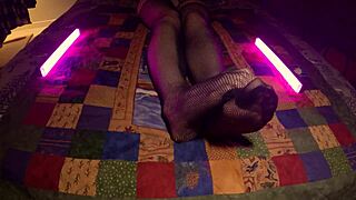 Sensual soles peek through fishnet pantyhose