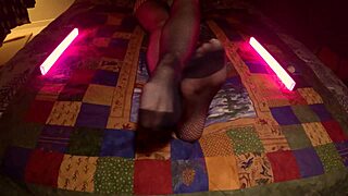 Sensual soles peek through fishnet pantyhose