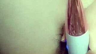 Hey, look at this Asian babe fingering her wet pussy till it overflows!