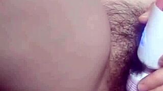 Hey, look at this Asian babe fingering her wet pussy till it overflows!