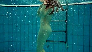 Vesta dives naked into the pool!