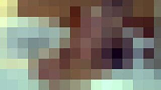 in lingerie, the babe kneels before her goddess, worshipping with feet and big tits in a femdom scene