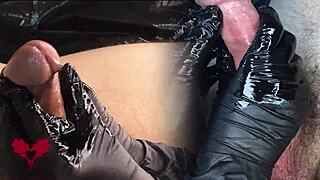 the mistress in latex gloves massages the sperm out of the cock