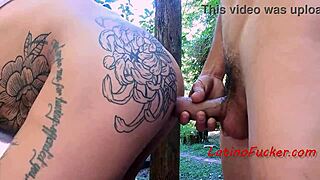 tending to his latino companion in the woods