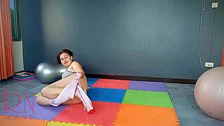 regina noir a woman in yoga leotards practices yoga in the gym transparent red leotard yoga nude c12