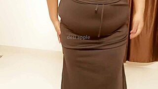 the big tits african milf shows off her boobs in casual scene