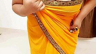 the big tits african milf shows off her boobs in casual scene