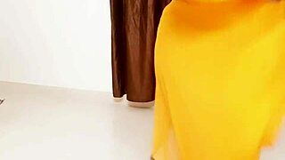 the big tits african milf shows off her boobs in casual scene