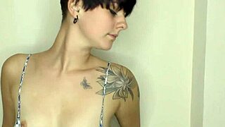 Big tits brunette babe cleans house, showing off downblouse charm.