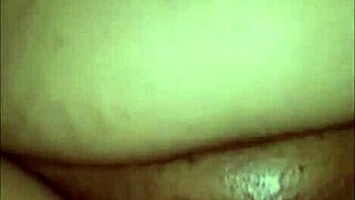 A white lesbian with a strapon has sex with an ebony fat MILF.