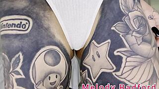 Melody Radford tries on pink micro bikini with chain