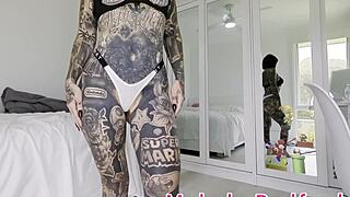 Melody Radford tries on pink micro bikini with chain