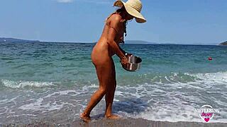 Nippleringlover shows off extreme pussy and nipple piercings at nude beach.