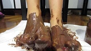 Goddess covers feet in chocolate cream!