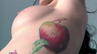 SHEMALE MILF TEASES CAMERAMAN WITH BIG TITS IN LINGERIE, MASTURBATING SOLO.