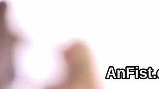 Wow! Hot lesbian babes fist tight holes with wild passion!