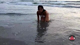 wet bikini model on beach day