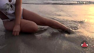 wet bikini model on beach day