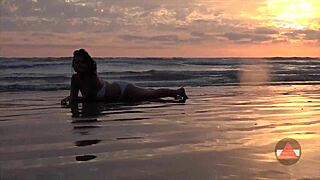 wet bikini model on beach day