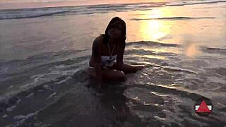wet bikini model on beach day