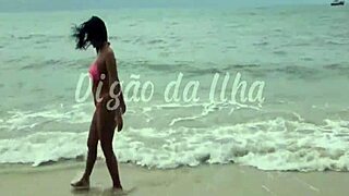 Gostosa is fucking two guys on the beach, her long hair flowing! 🌊