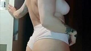 Hey, check this tattooed hottie showing off her tan lines for the web! How sexy is that?