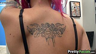 girl with pink hair gets facial