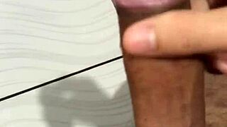 watch him stroking and cumming hard in solo gay action