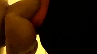 Gay guy in hood deepthroating a dildo