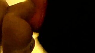 Gay guy in hood deepthroating a dildo