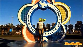 Beautiful woman shows her legs in Olympic Park in Sochi, 2014