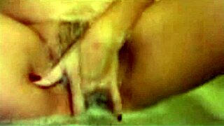 Hey, she's masturbating in the bath like a hot milf