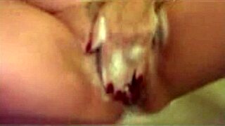 Hey, she's masturbating in the bath like a hot milf