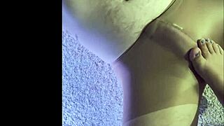 Wife helps husband wear wet pantyhose for foot massage.