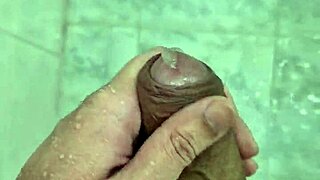 Feeling so hot watching this Brazilian twink jerk off in the shower till he cums.