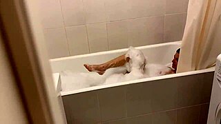 Skinny young blonde in bubble bath webcam, her small tits exposed as she gets fucked hard by gay amateurs!