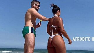 Afrodite sucking dick doggystyle on the beach, feeling so intense in this group bang.
