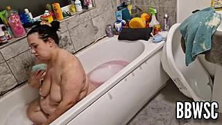 pervert spies on bbw washing giant floppy tits in bath