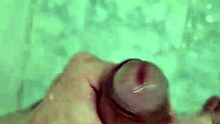 Cute Brazilian twink masturbates solo in homemade shower scene.