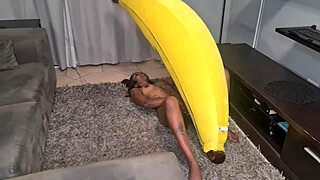 tattooed indian woman demonstrates banana close-ups