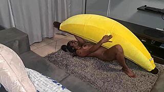 tattooed indian woman demonstrates banana close-ups