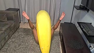 tattooed indian woman demonstrates banana close-ups