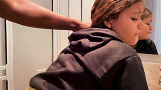 Young 18-year-old woman bent over, fucking a black man in the bathroom.