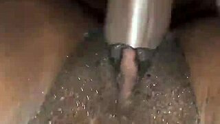 dark chocolate ebony babe stretches her pussy with huge cock!