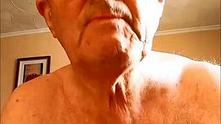 Mature woman gives handjob to hairy cock, masturbating to cumshot on homemade video