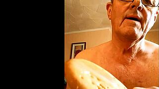 Mature woman gives handjob to hairy cock, masturbating to cumshot on homemade video