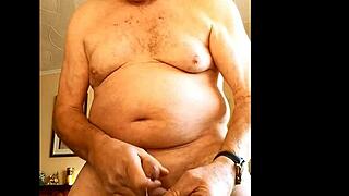 Mature woman gives handjob to hairy cock, masturbating to cumshot on homemade video