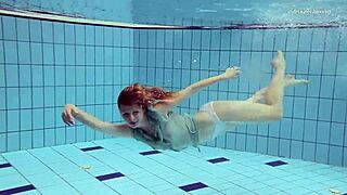 Tiny ass russian brunette nastya in a tight dress has outdoor underwater sex with european babe