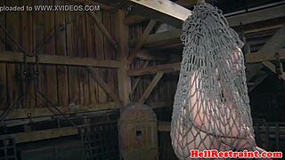 Bound sub faces harsh whipping as punishment in a kinky maledom humiliation scene. Her shaved pussy endures intense torment.