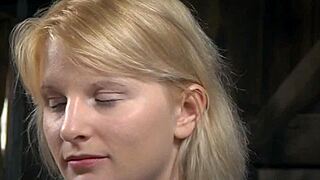 Bound sub faces harsh whipping as punishment in a kinky maledom humiliation scene. Her shaved pussy endures intense torment.